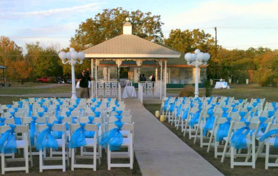  with her Royal Blue and White color scheme from chair sashes to cake